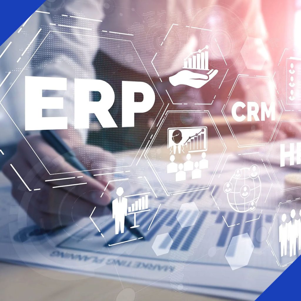 A hand pointing at a document with a digital overlay showing the words "ERP" and "CRM" and icons for business processes, representing the solutions from JR Digital Media.